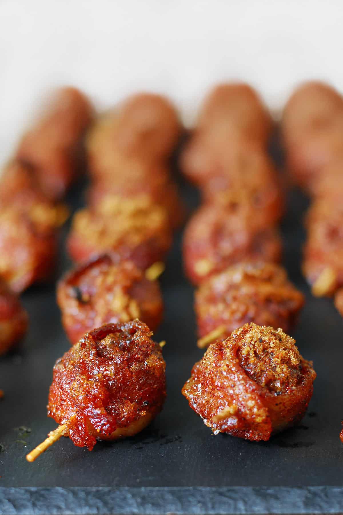 Brown sugar spicy bacon wrapped meatballs.