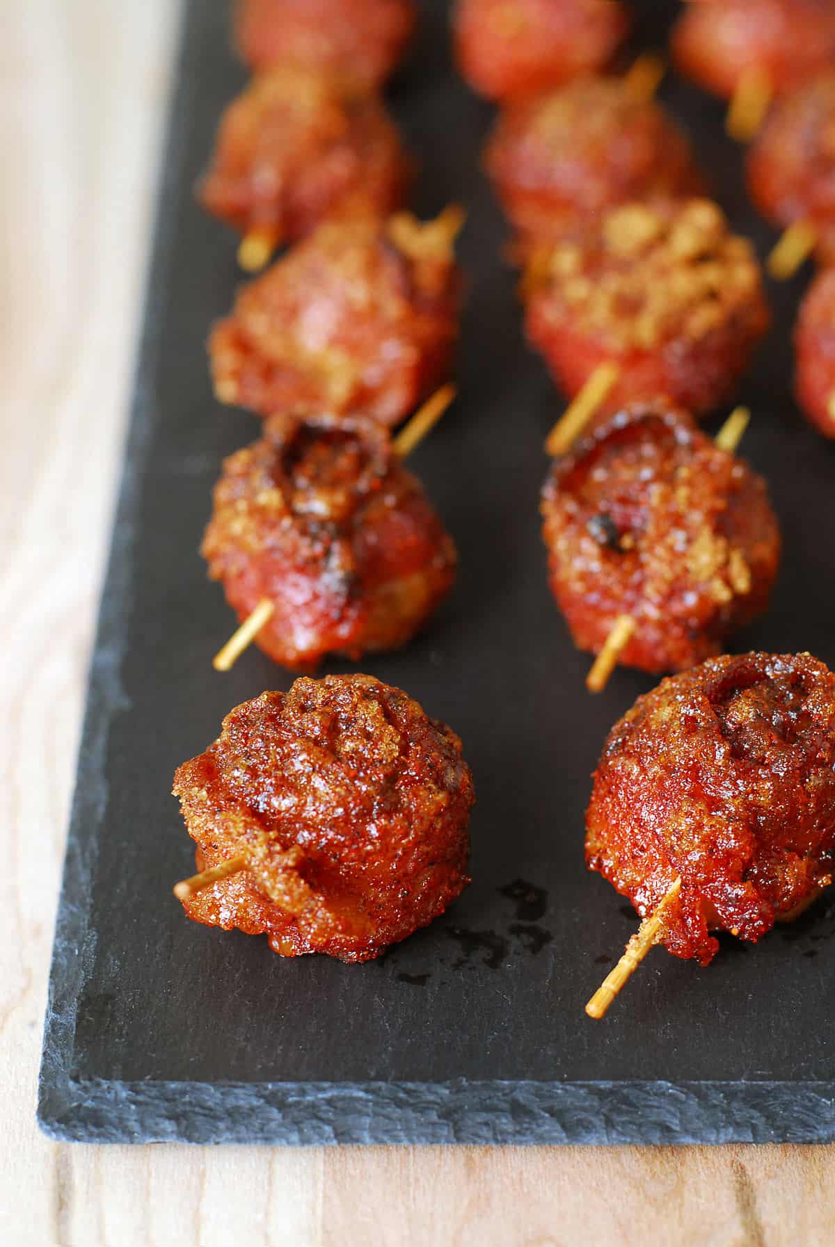 Spicy and sweet bacon wrapped meatballs.