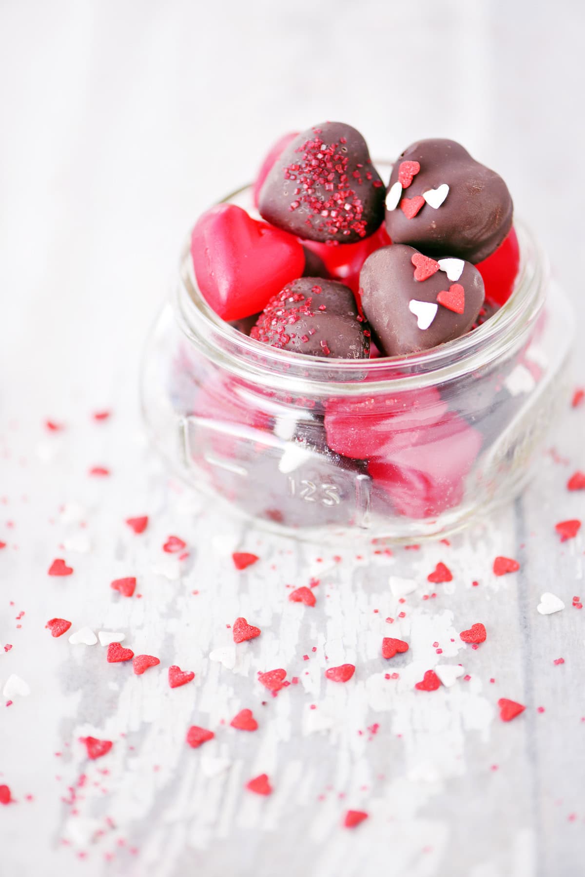 Gummy hearts covered with chocolate.