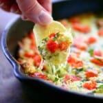 Cheesy caprese dip scoop.