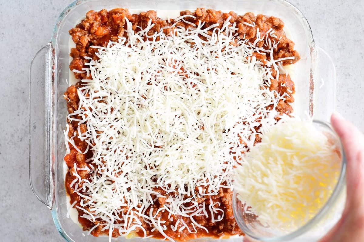 Top casserole with shredded mozzarella cheese.