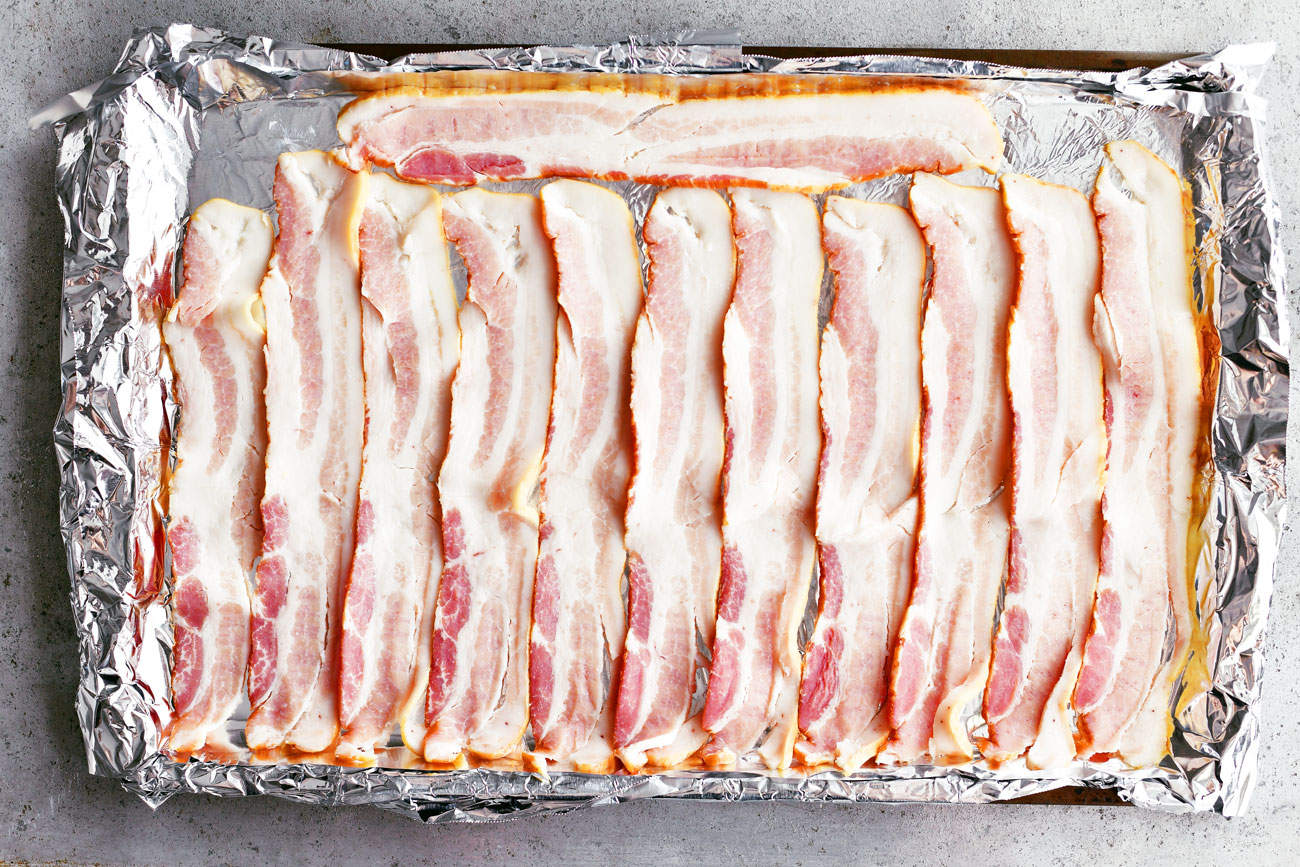 https://www.thegunnysack.com/wp-content/uploads/2019/02/How-To-Cook-Bacon-In-The-Oven-Recipe.jpg