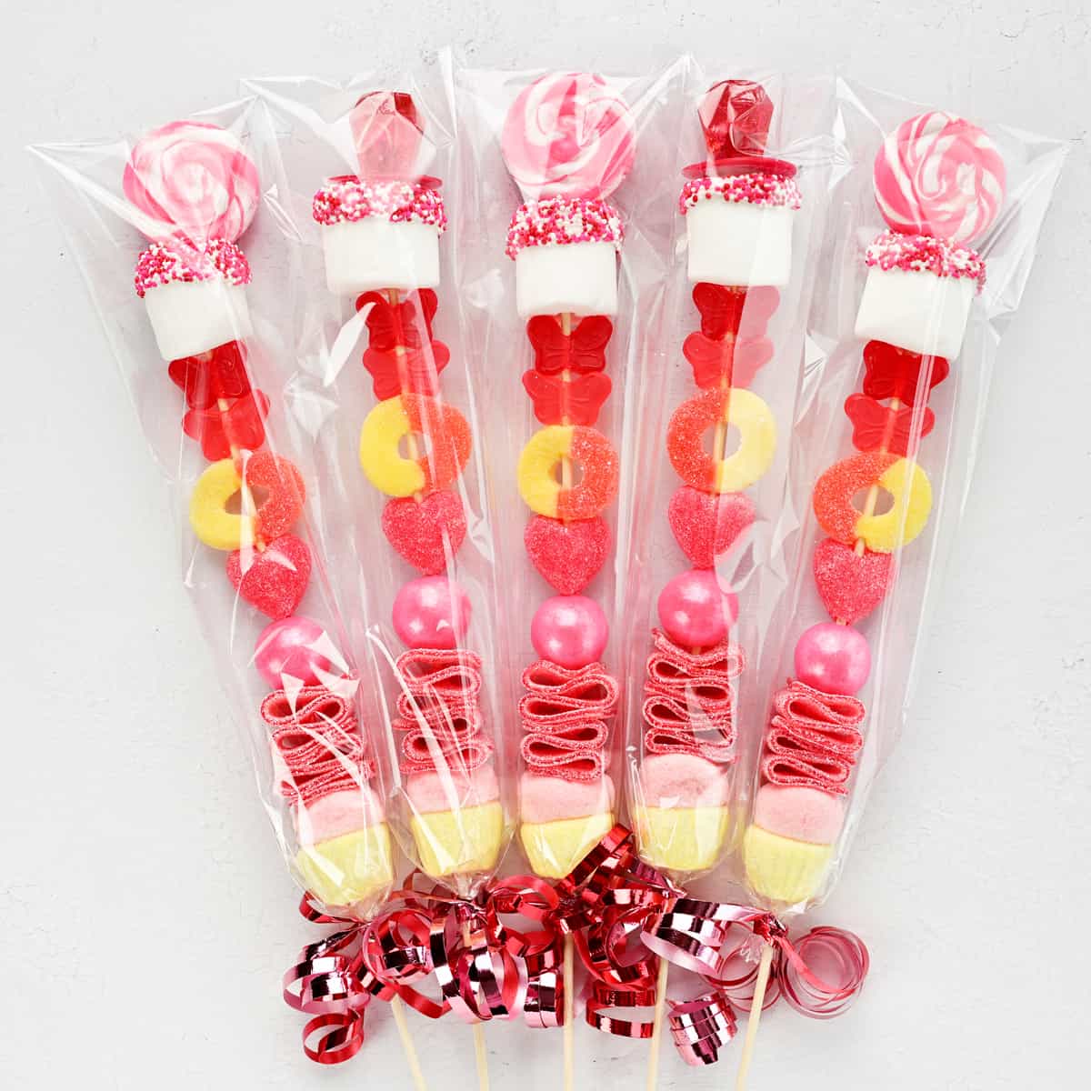 https://www.thegunnysack.com/wp-content/uploads/2023/01/Candy-Sticks-Wrapped-SQR.jpg