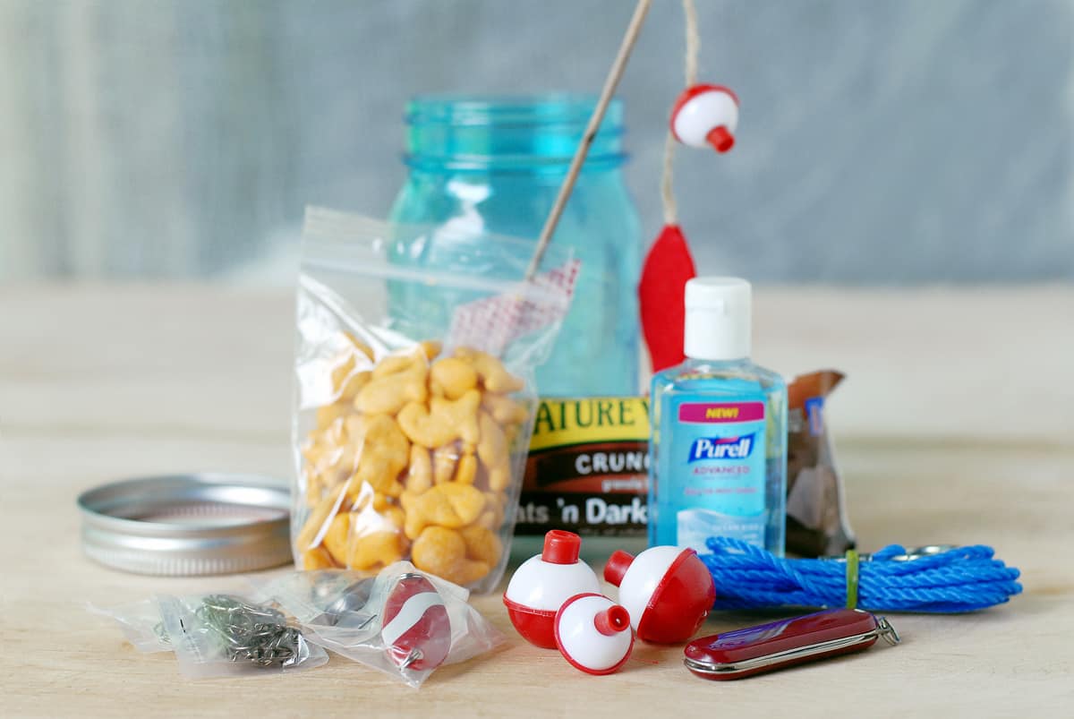 Help me build fishing themed sensory jar party favors for my son's fir