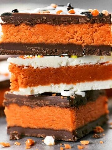 A stack candy corn truffle bark with butterfinger filling.