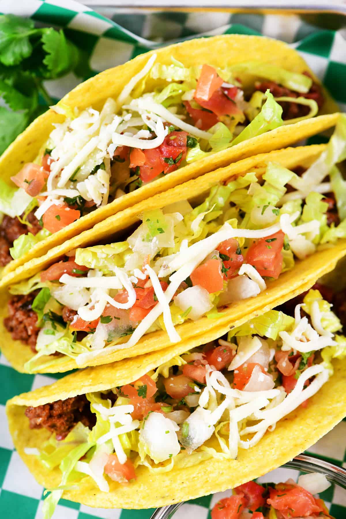 Trio of hard shell slow cooker tacos.