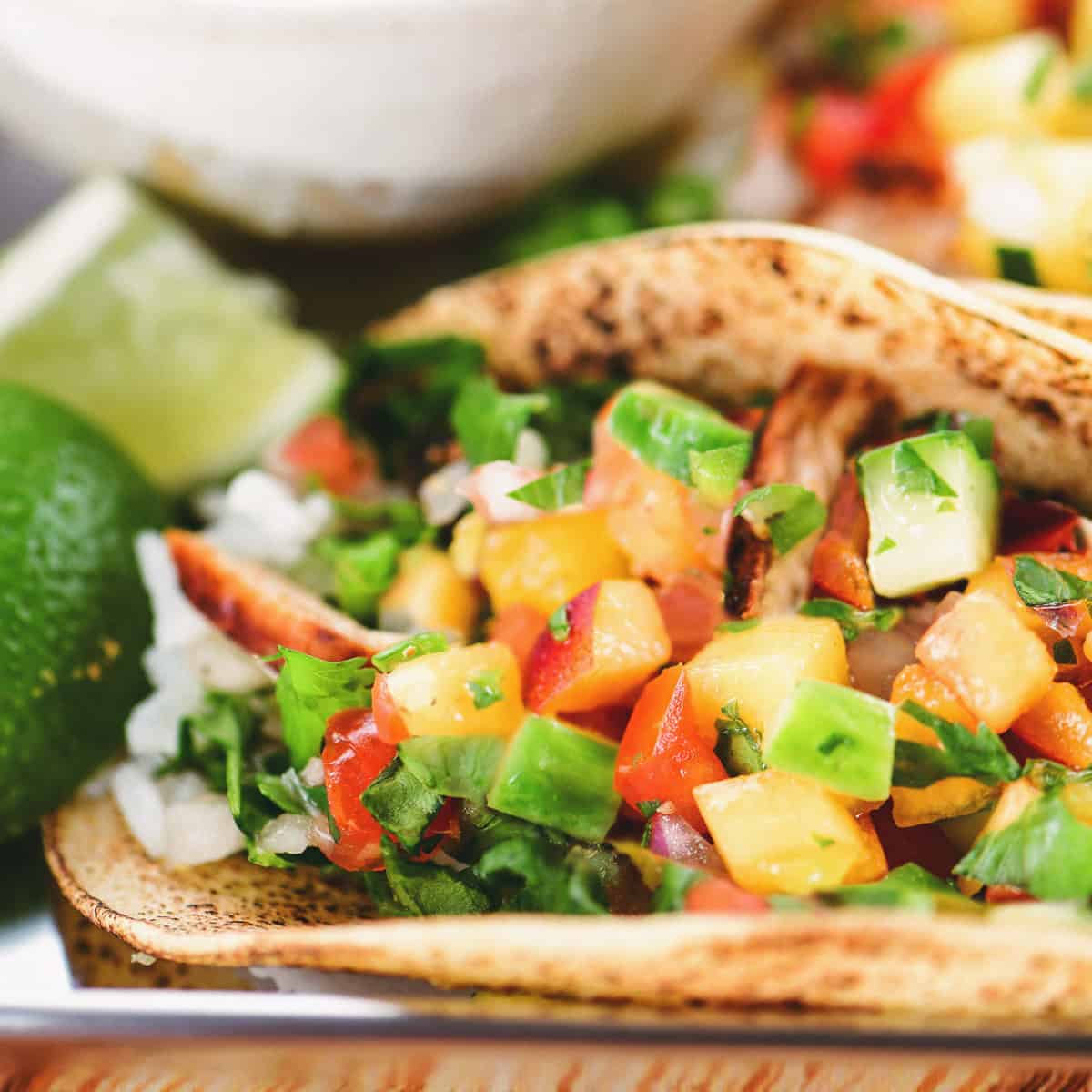 Peach salsa on chicken tacos.