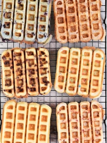 Waffles sticks cooling on a wire rack.