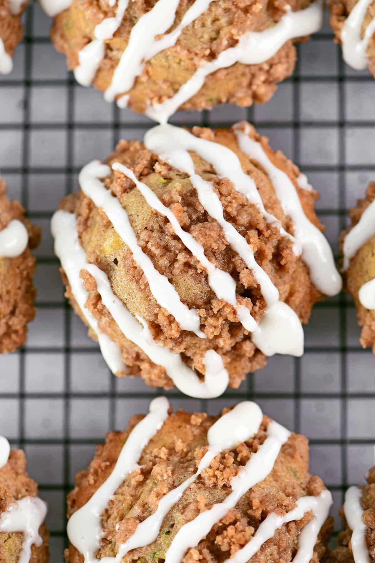 Zucchini crumble muffins with glaze.