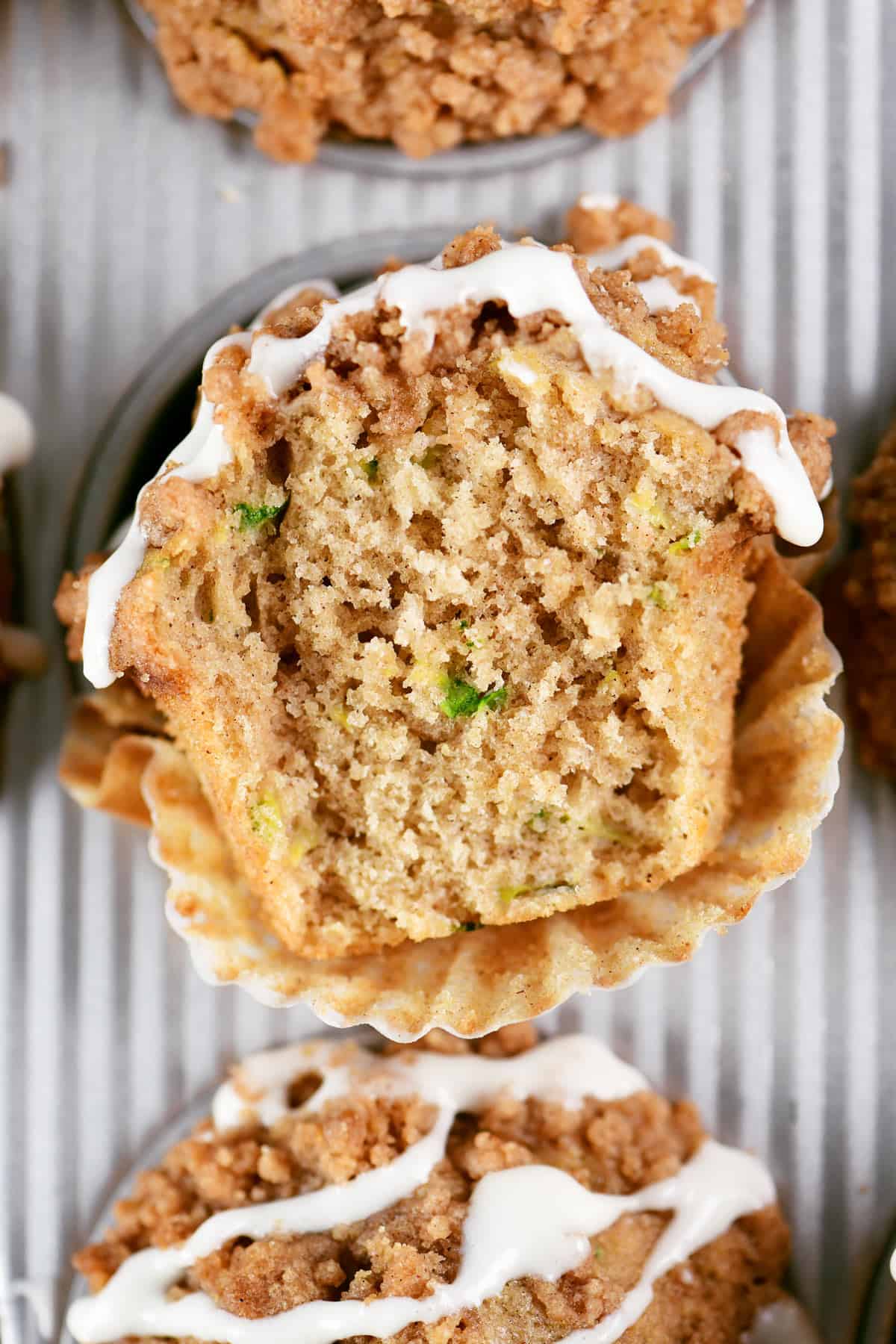 Sliced zucchini muffin in pan.