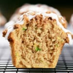 Zucchini muffins with crumble topping and glaze.