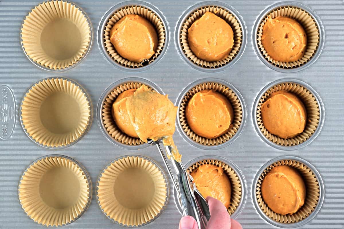 Adding batter to the pan.