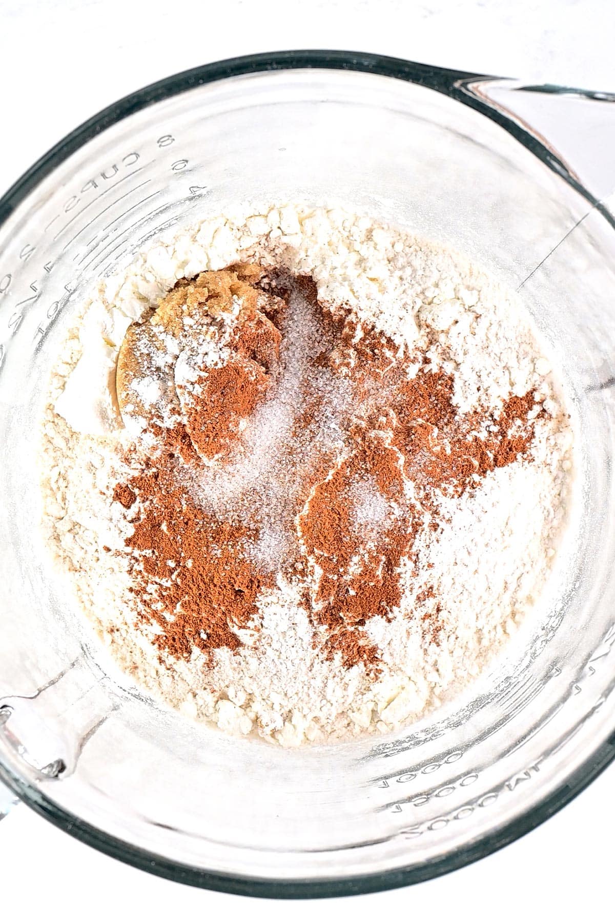 Dry ingredients in a glass bowl.