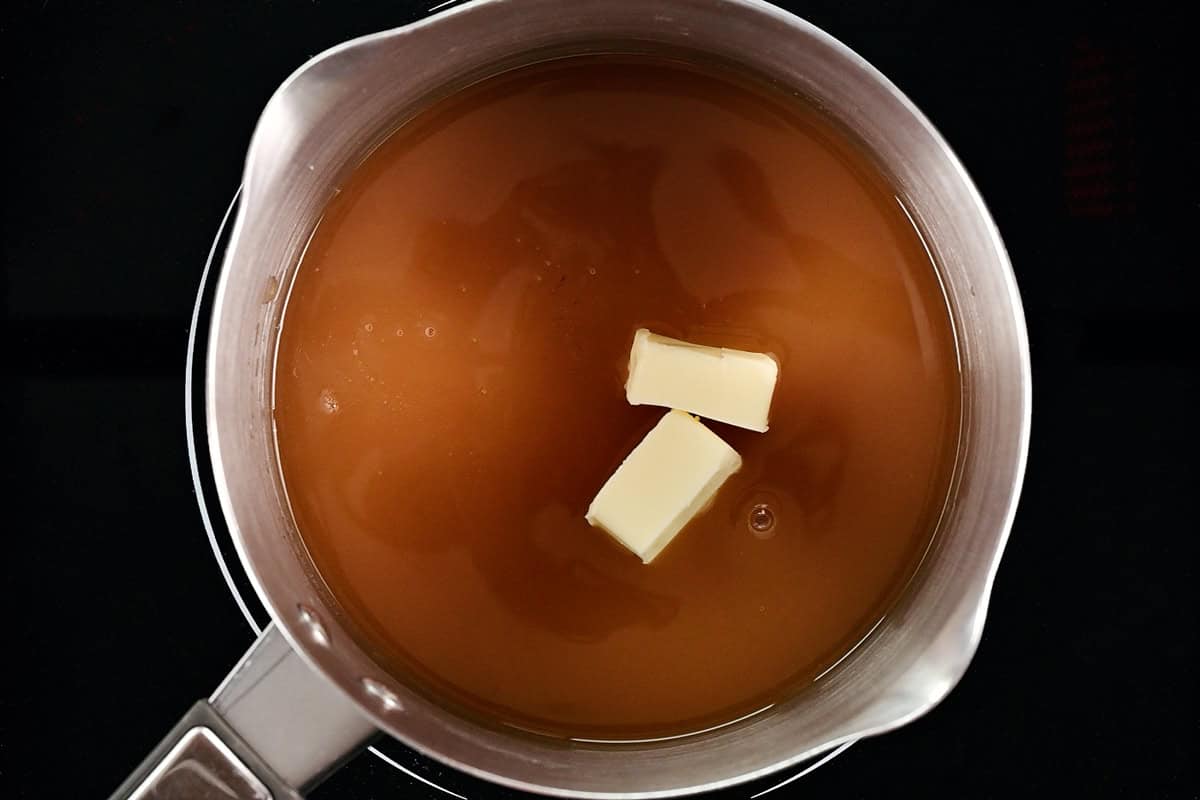 Wet ingredients in a saucepan.