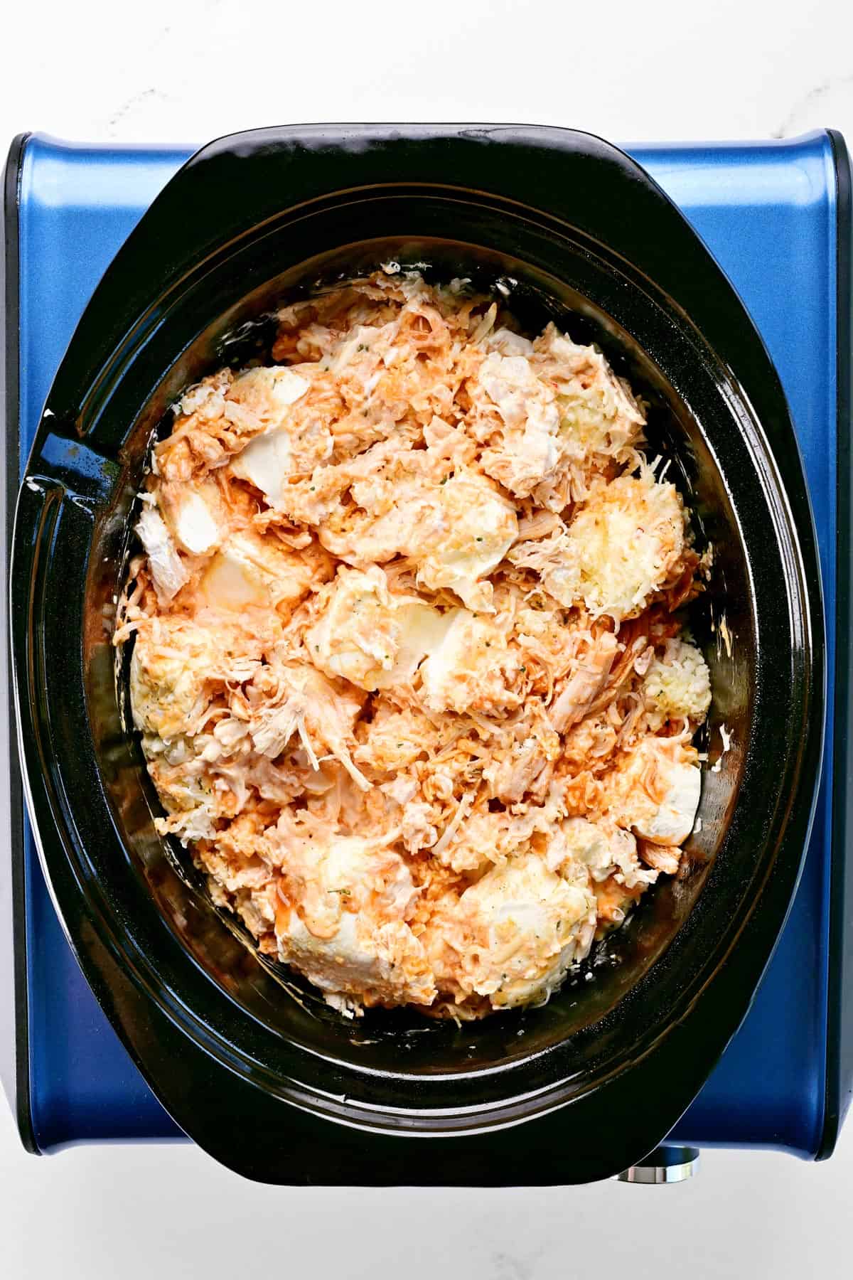 Ingredients combined in crockpot.