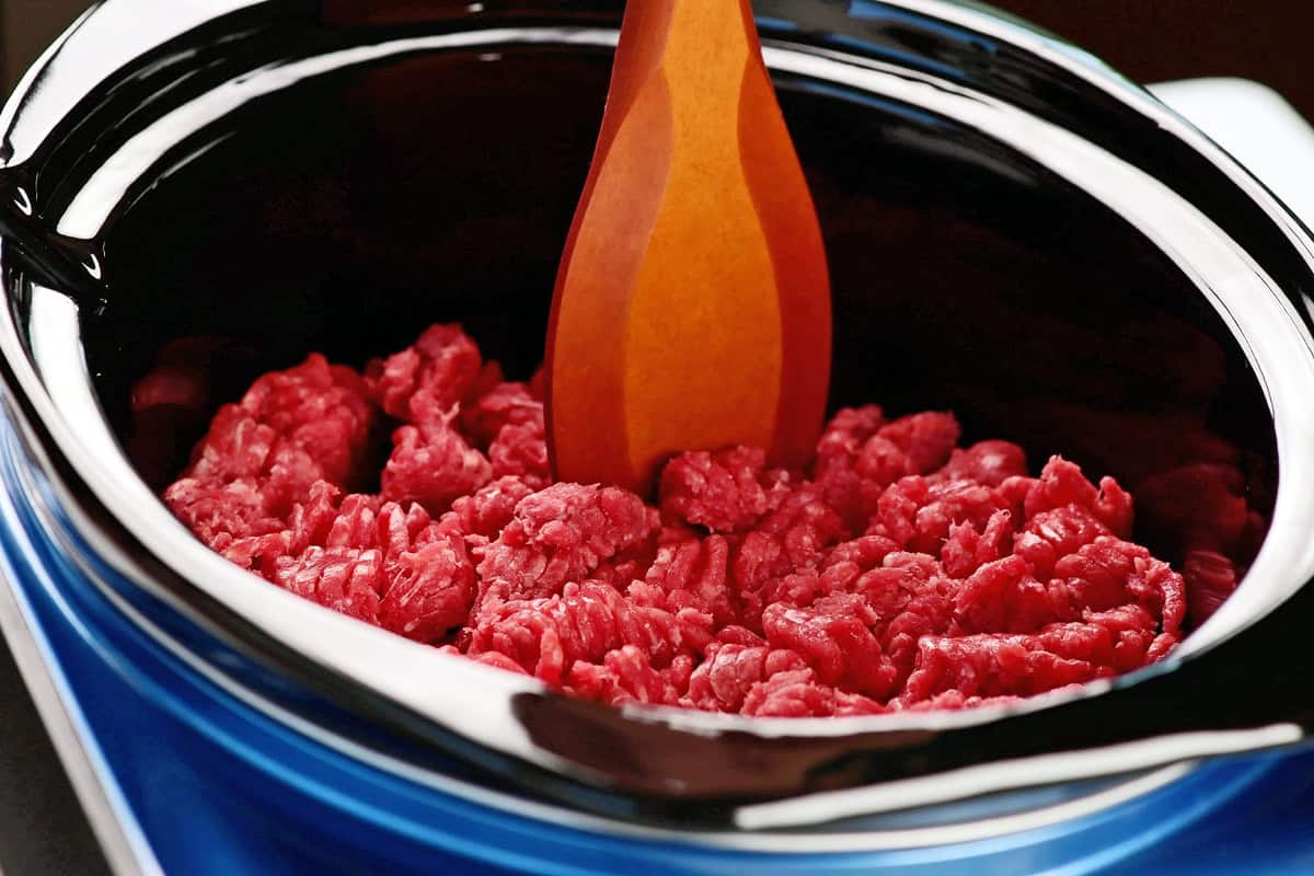 Lean ground beef in crockpot.