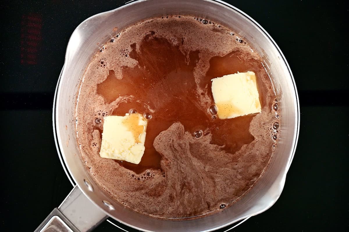 Butter and wet ingredients in a saucepan.