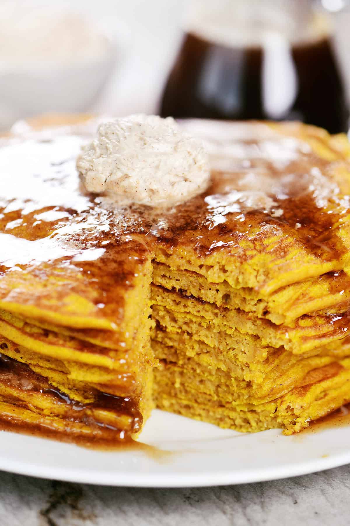 Pumpkin pancakes stack with section removed.