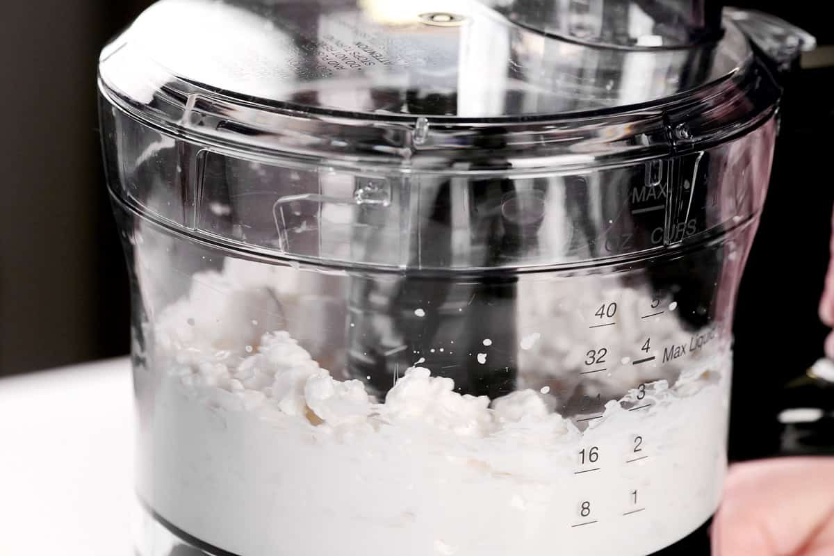 Cottage cheese in food processor.