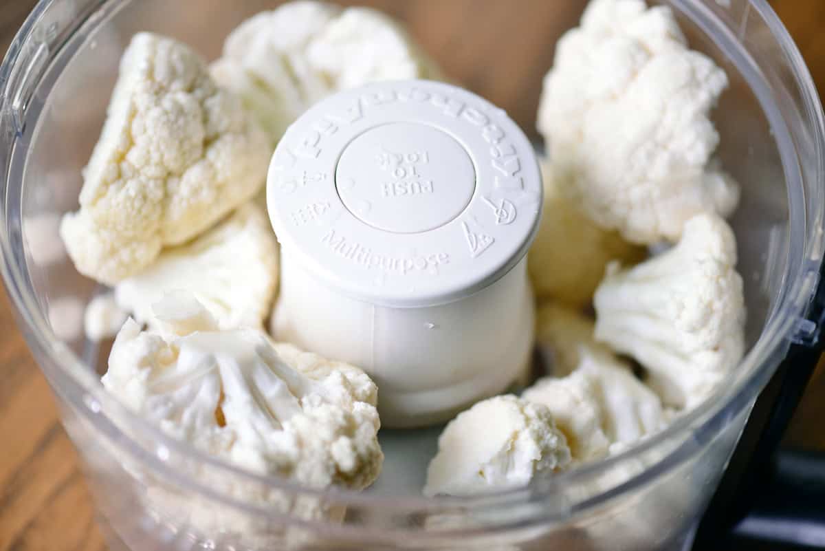 Cauliflower florets in a food processor.